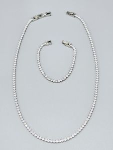 Ocelový náhrdelník štrasový pruh s kamínky ve tvaru kruhu