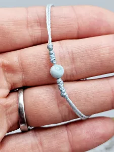 Dětský provázkový náramek Larimar kulička v modré s uzlíky (14 - 24,5 cm)